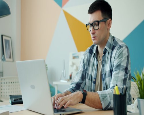 person working on computer screen